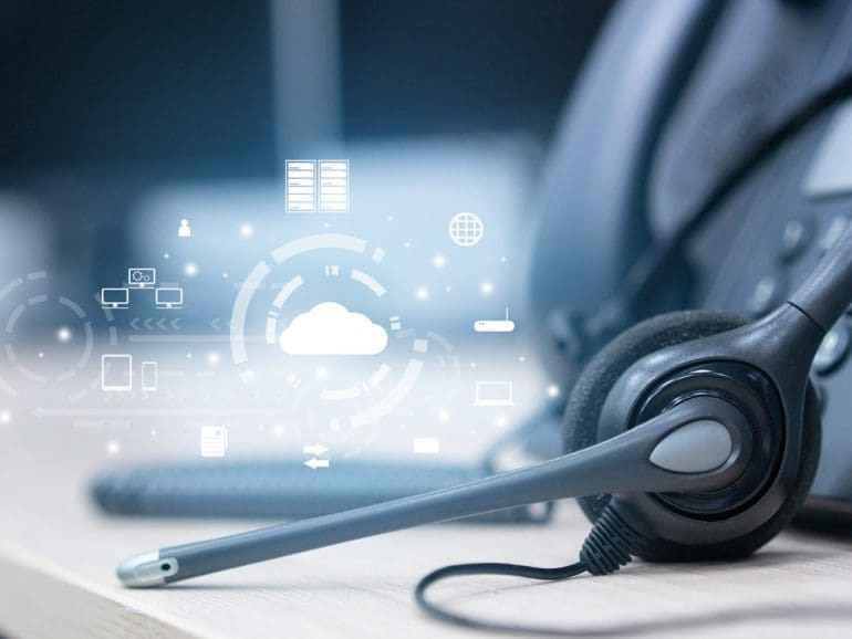 close up on headset telephone with cloud data center to synchronize on SaaS host server to working on system for futuristic technology and business marketing concept