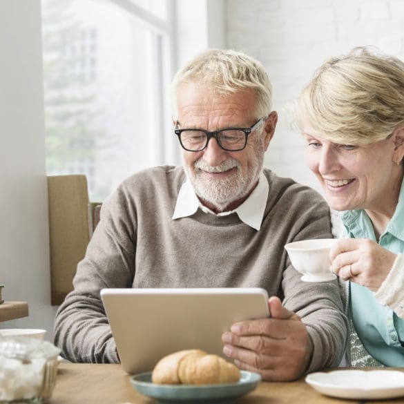 Senior Adult Using Digital Device Tablet Concept