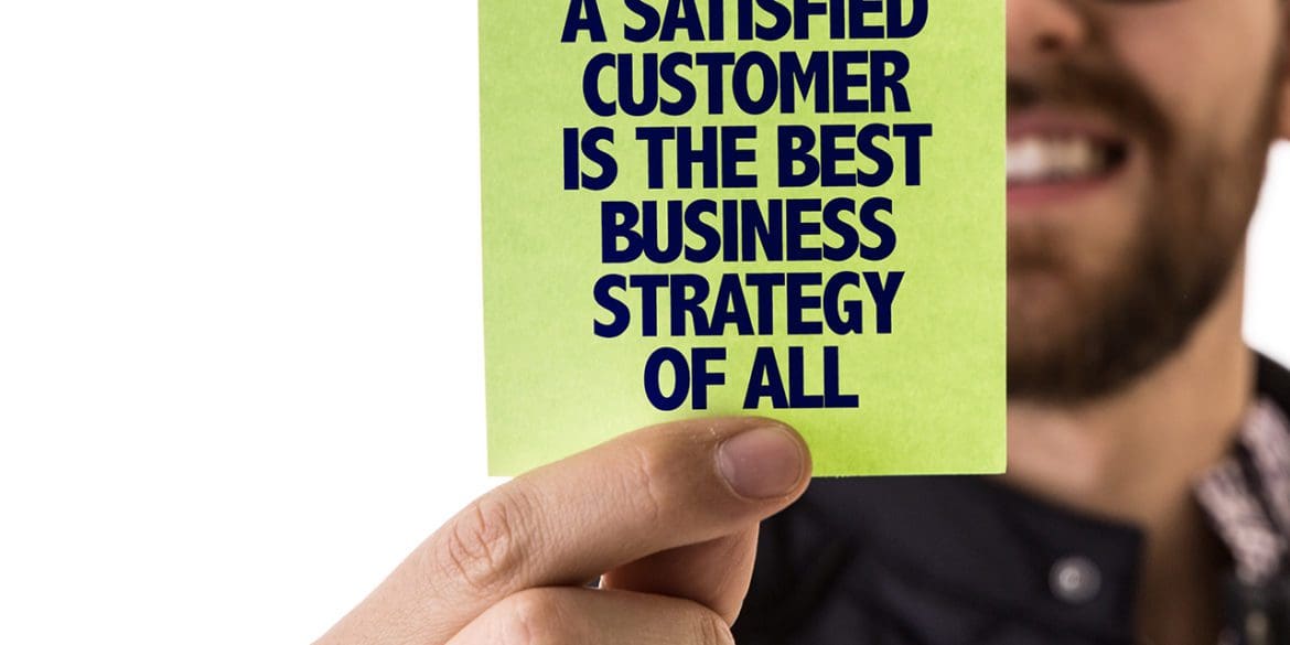 A Satisfied Customer Is The Best Business Strategy of All sign