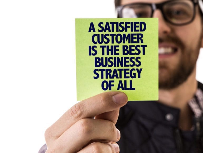 A Satisfied Customer Is The Best Business Strategy of All sign