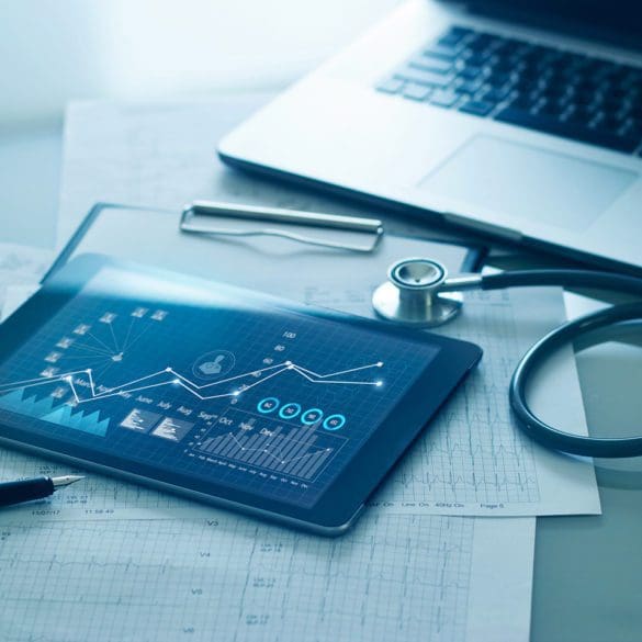 Healthcare business concept, Medical examination and growth graph data of business on tablet with doctor's health report clipboard on background.