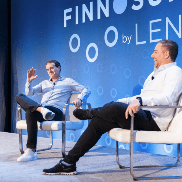 Steve McLaughlin of FT Partners shares a laugh with Paulo Passoni of Softbank