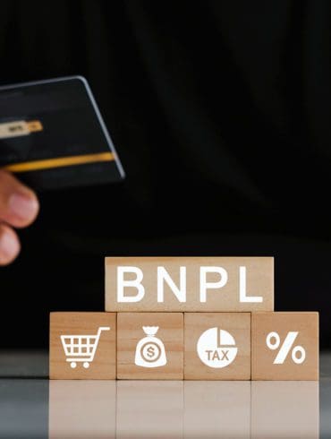 Man's hands holding credit card with BNPL icons. Buy now pay later online shopping concept. Online shopping icons.