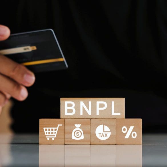 Man's hands holding credit card with BNPL icons. Buy now pay later online shopping concept. Online shopping icons.