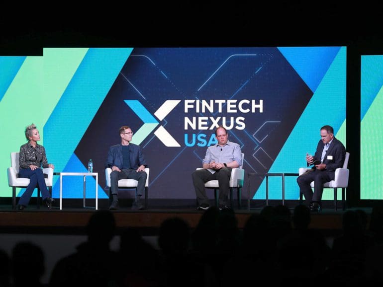 Sarah Clark, SVP of Digital Identity at Mastercard (left), Ahron Geminder (middle right), global head of product for third-party services at HSBC, and Mike Tuchen (center left), CEO at Onfido, sat down with moderator Bo Brustkern on the Fintech Nexus USA keynote stage in NYC on May 25, 2022.