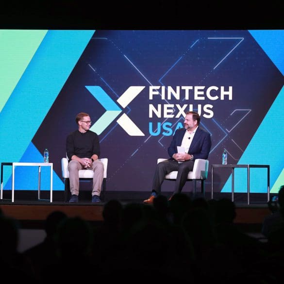 Chris Britt (left) was a keynote speaker at Fintech Nexus 2022. He was interviewed by Paul Stamas from General Atlantic