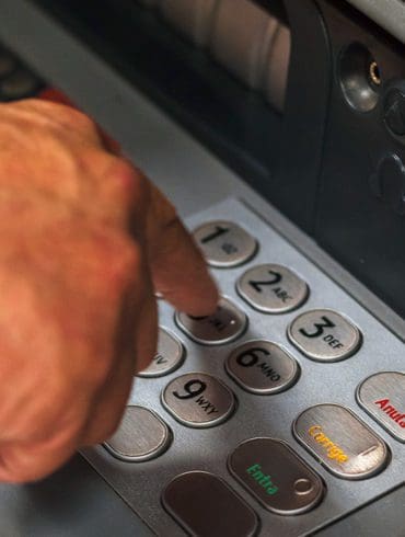 hand using ATM