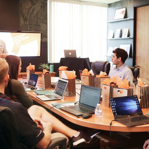 Team at large meeting table