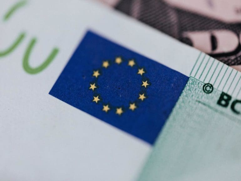 european union flag, yellow stars in a circle blue background