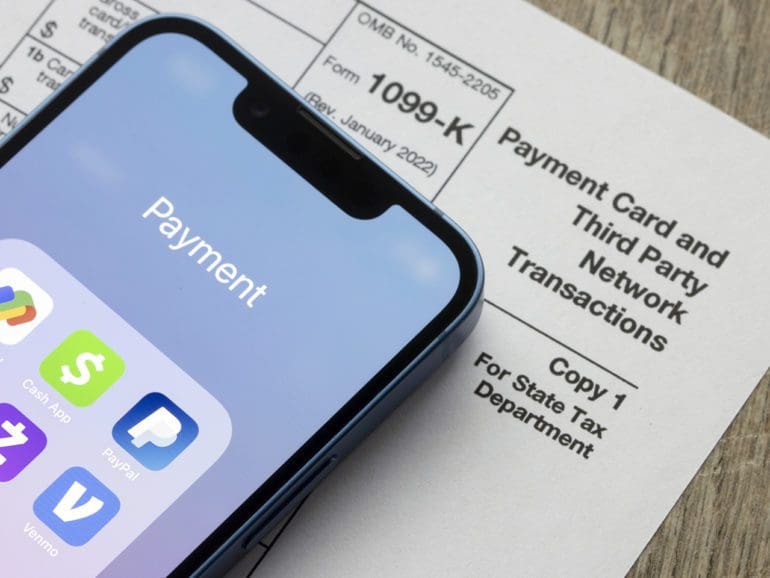 Jan 5, 2022: Payment apps like PayPal and Venmo are seen on an iPhone on top of Form 1099-k. Third-party payment apps now have to report transactions more than USD600 to the IRS.