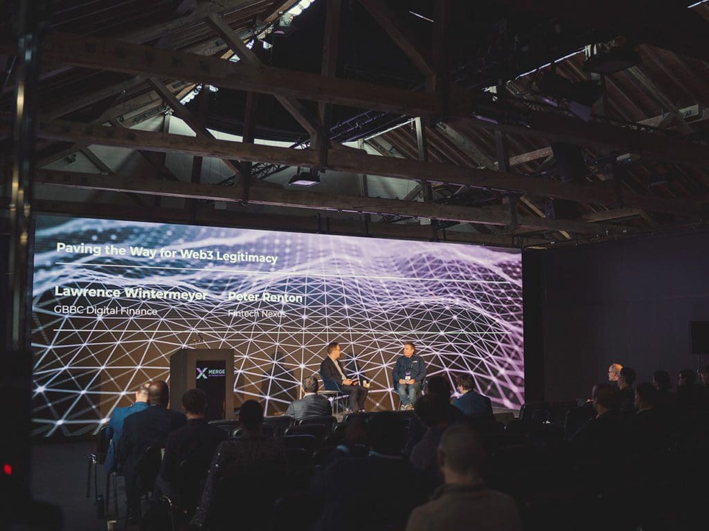 Lawrence Wintermeyer (right) joins Fintech Nexus chairman Peter Renton for a fireside chat at Merge in London on Oct. 17, 2022.