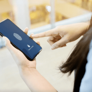 Woman using biometrics on smartphone