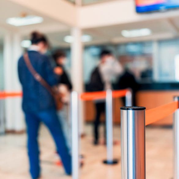 row of people to the bank teller cashier defocused background