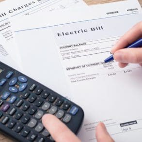 Electric bill charges paper form on the table