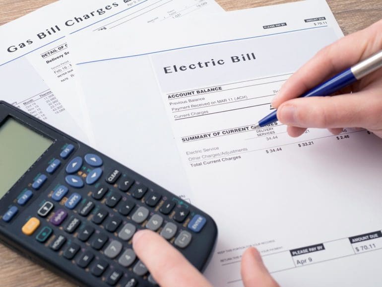 Electric bill charges paper form on the table