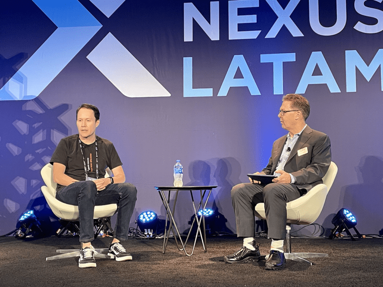 Jairo Ochoa, Inter, left, is interviewed by Fintech Nexus chairman Peter Renton for the Disrupting the Banking Ecosystem session.