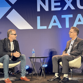 Wagner Ruiz, EBANX, left, chats with Fintech Nexus chairman Peter Renton on the Payments Innovations in Rising Markets session on the keynote stage.