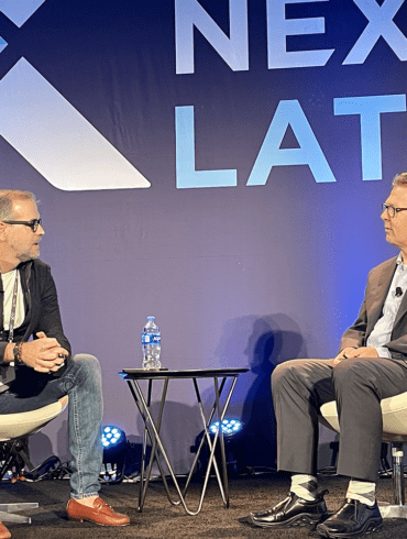 Wagner Ruiz, EBANX, left, chats with Fintech Nexus chairman Peter Renton on the Payments Innovations in Rising Markets session on the keynote stage.