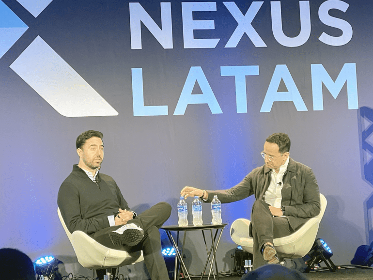 Adalberto Flores of Kueski, left, chats with moderator Pepe Bolanos of Cometa in first session at Fintech Nexus LatAm 2022 in Miami on Dec. 13, 2022.
