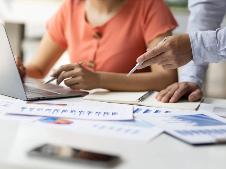 Business accountants are coaching laptop-based apprentices on tax systems, financial accounting and budget management.