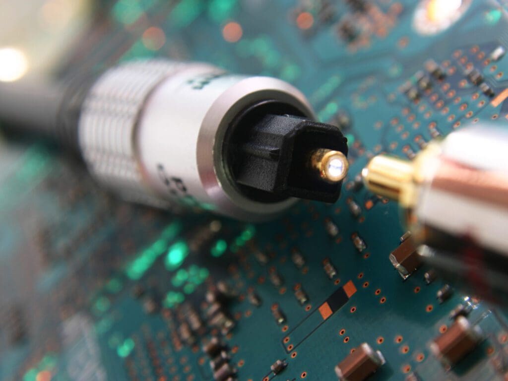 Computer electronics. Fiber optic cable connector in focus
