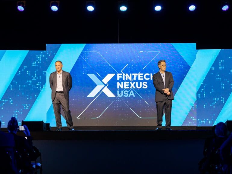 Fintech Nexus CEO Bo Brustkern, (left), joins Chairman Peter Renton to open the Fintech Nexus USA 2023 event on the keynote stage at the Javits Center in New York City on May 10, 2023.