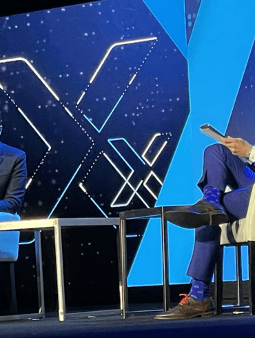 Phil Goldfeder, CEO of American Fintech Council, right, interviews Rohit Chopra, Director, Consumer Financial Protection Bureau, on the keynote stage at Fintech Nexus USA 2023 at the Javits Center in New York City. | John K. White, Fintech Nexus