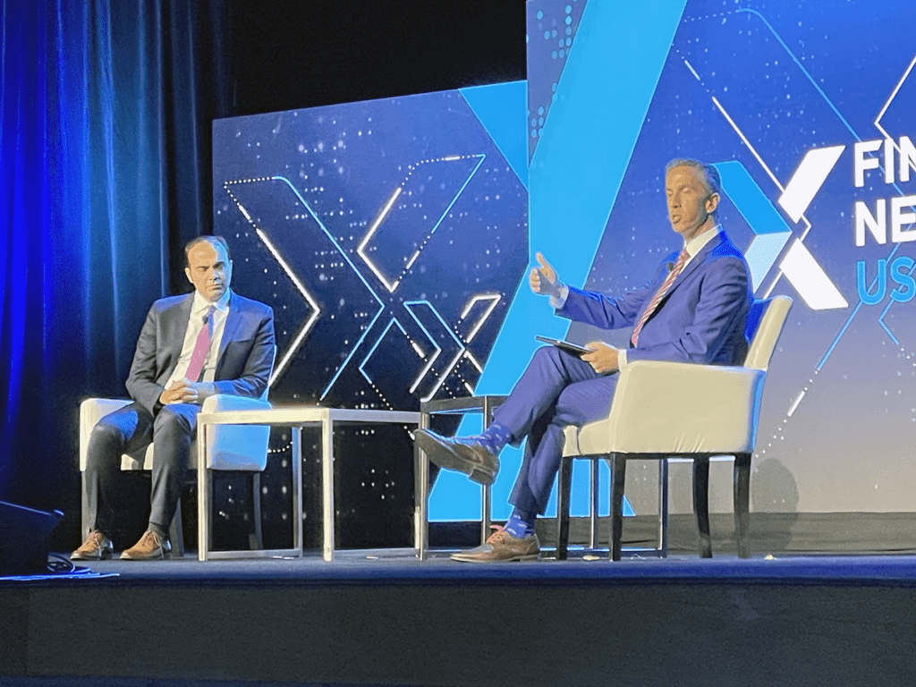 Phil Goldfeder, CEO of American Fintech Council, right, interviews Rohit Chopra, Director, Consumer Financial Protection Bureau, on the keynote stage at Fintech Nexus USA 2023 at the Javits Center in New York City. | John K. White, Fintech Nexus