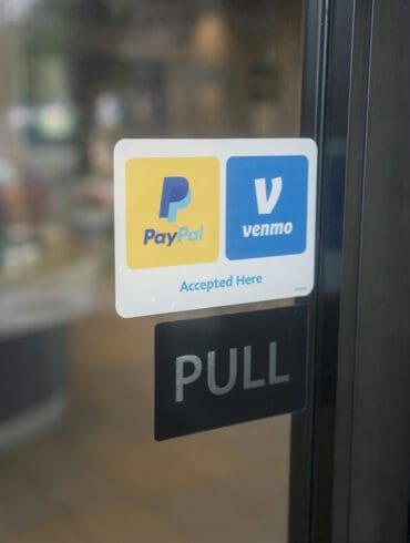 PayPal and Venmo Accepted Here sticker is seen at the entrance to a Panda Express restaurant in Sherwood, Oregon.