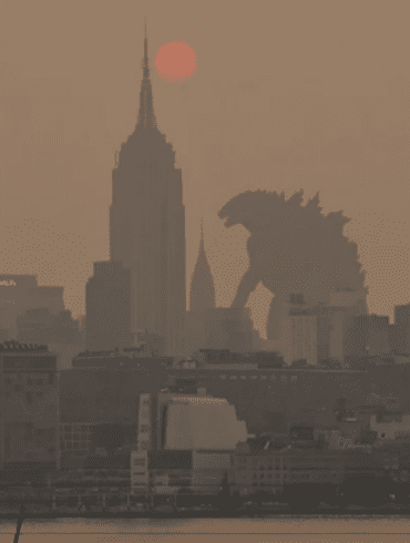 Photoshop of Godzilla walking through NYC in the smoke