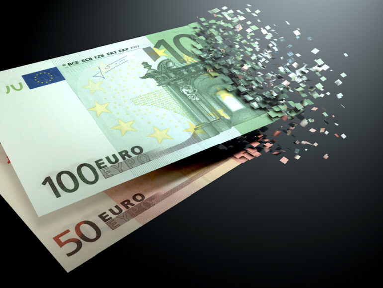 The dematerialization of money, euros are dematerialized on a black background.